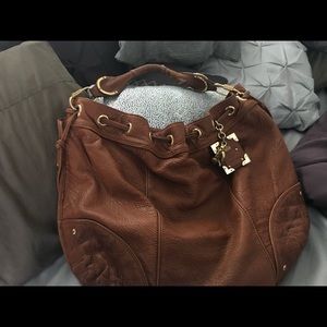 Slightly used leather juicy couture purse